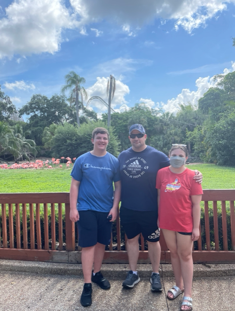 Captain Jason Miller with his children at Gatorland in Orlando, Florida.