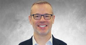 Middle-aged Caucasian man with glasses