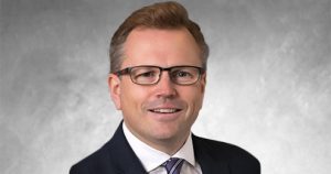 brown hair, blue eyed middle age Caucasian